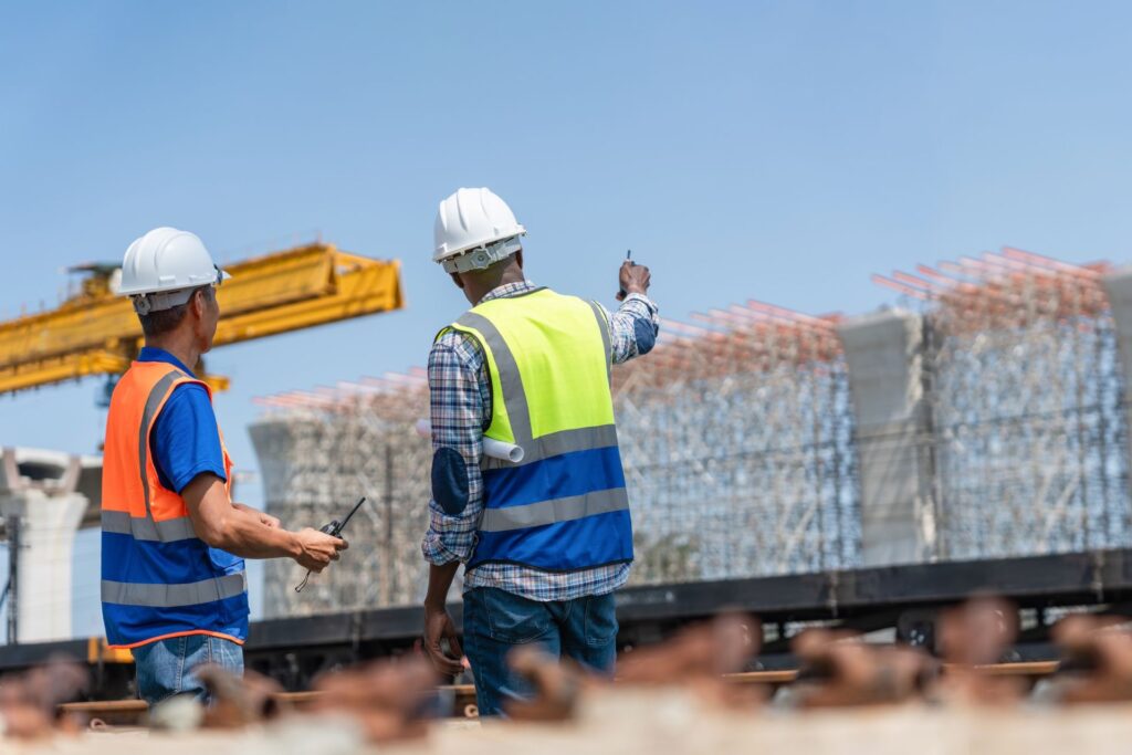 Two men at a construction site